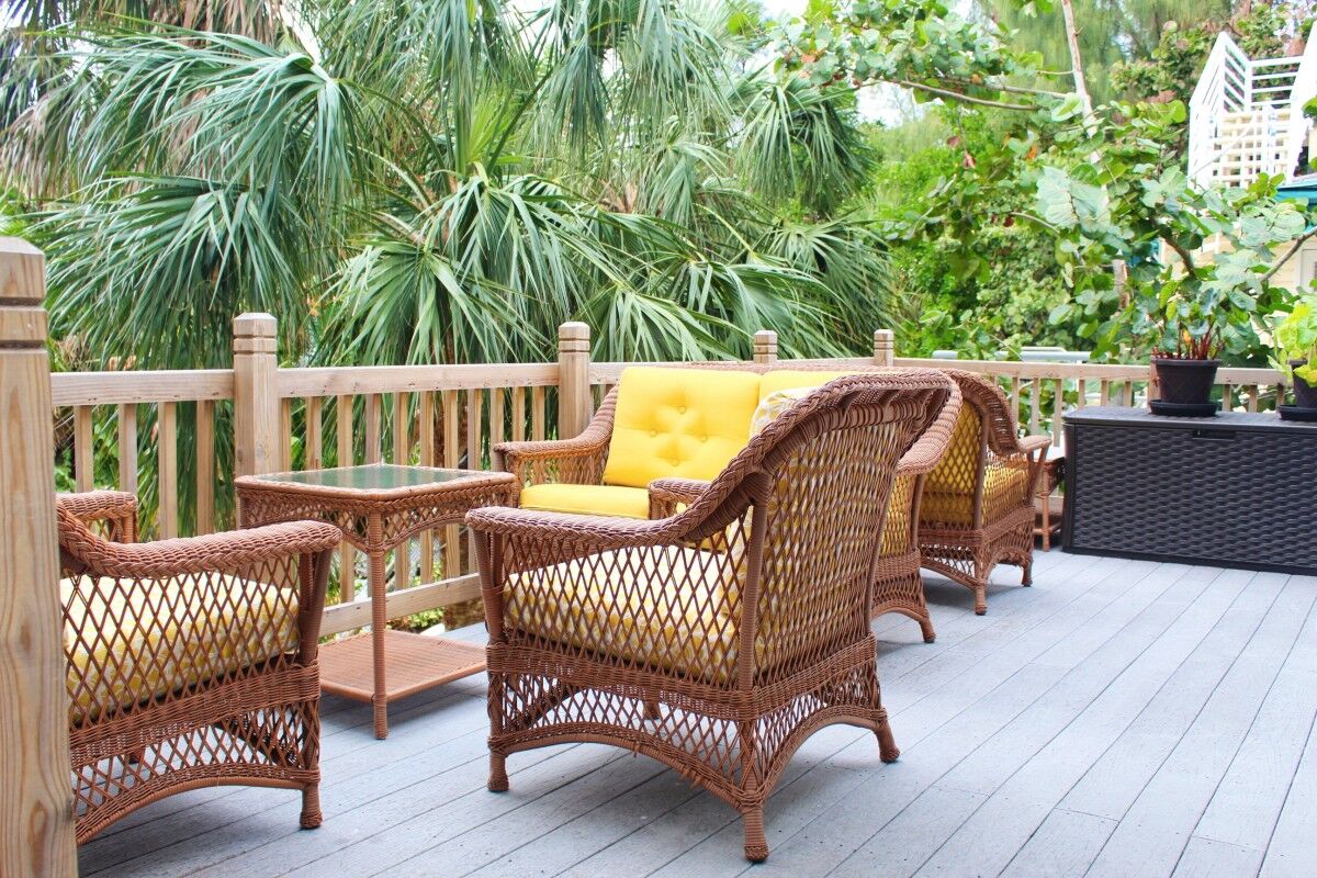 porch with brown chairs