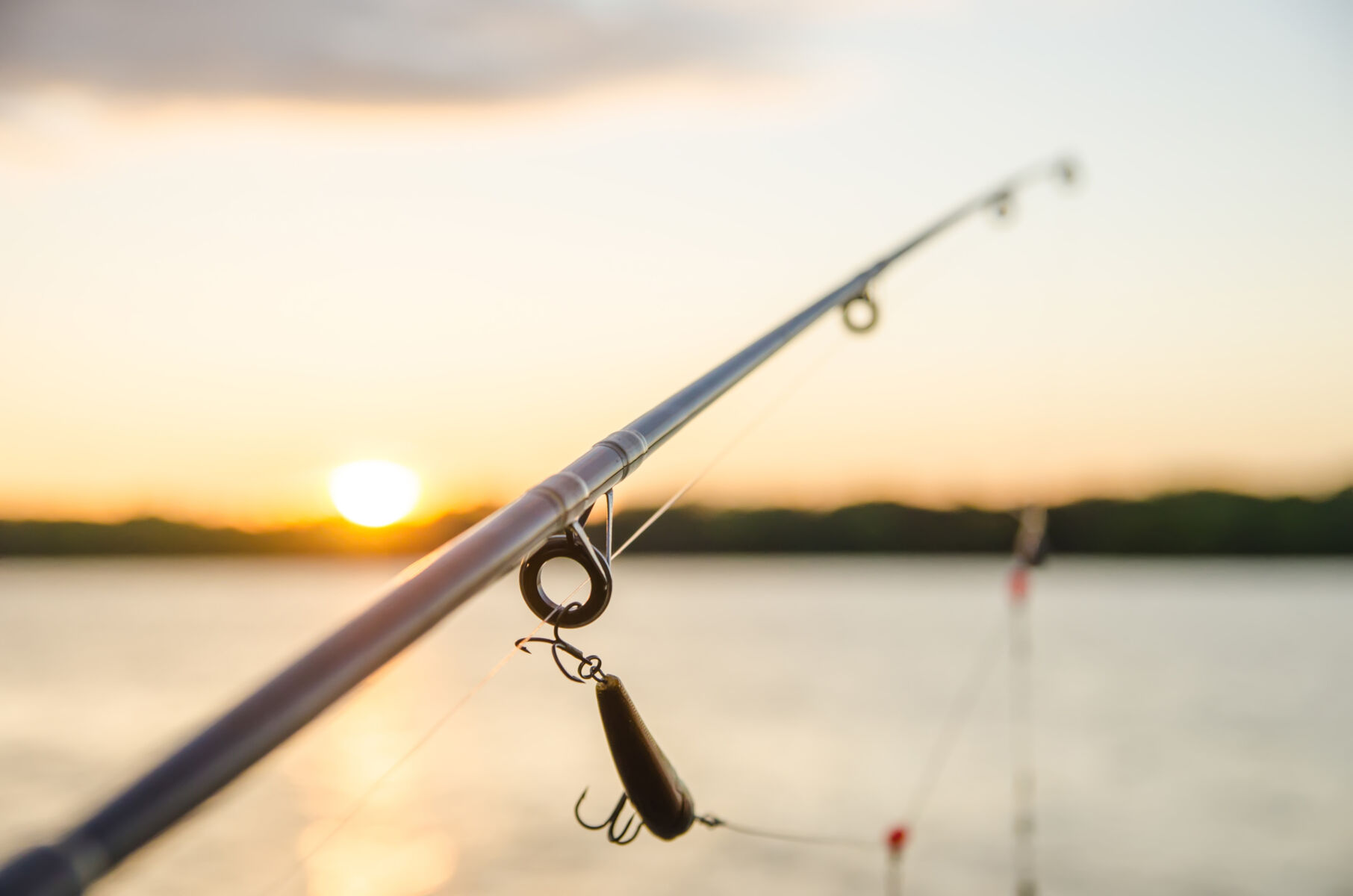 fishing at sunset